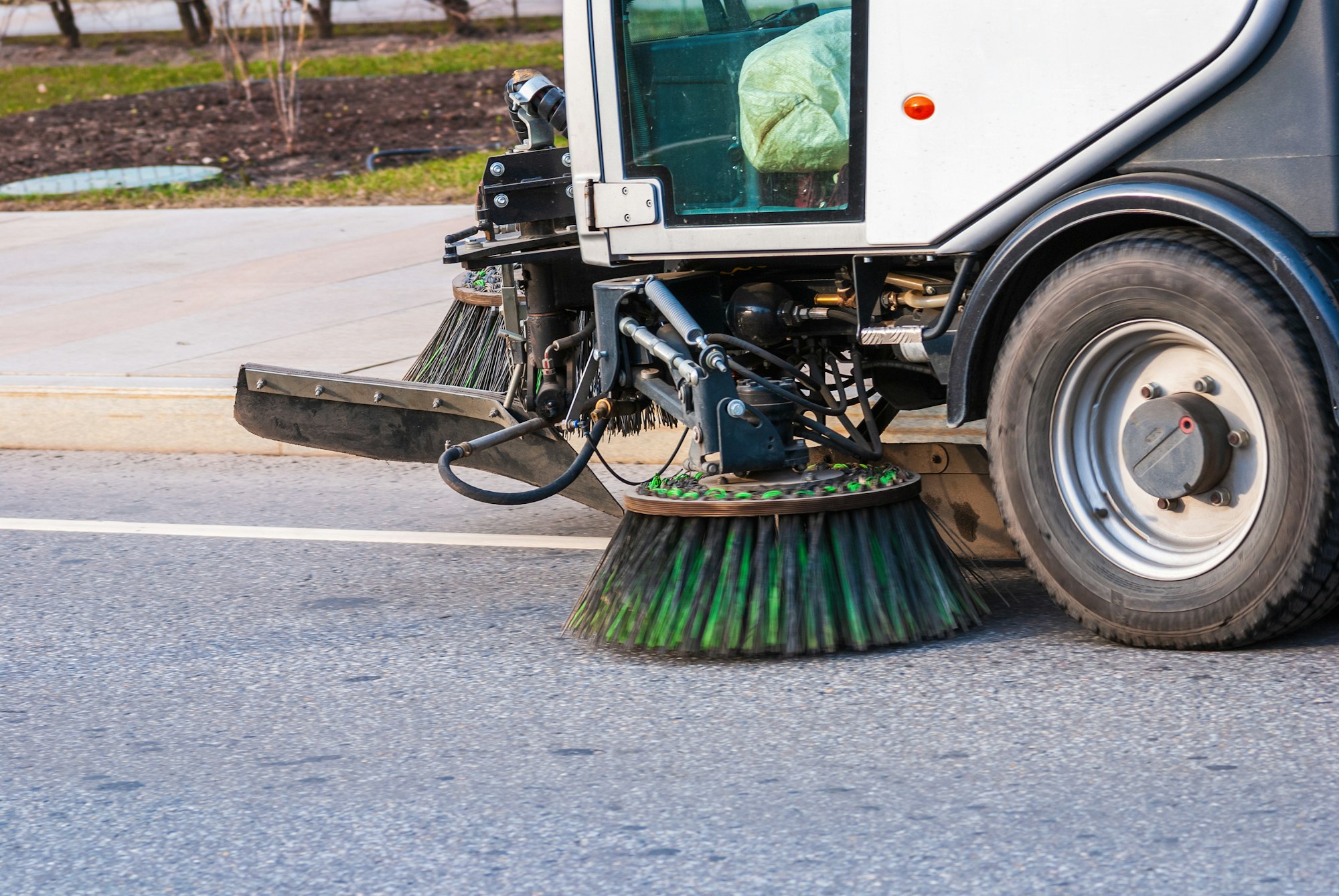 Street sweeper truck cleaning city road